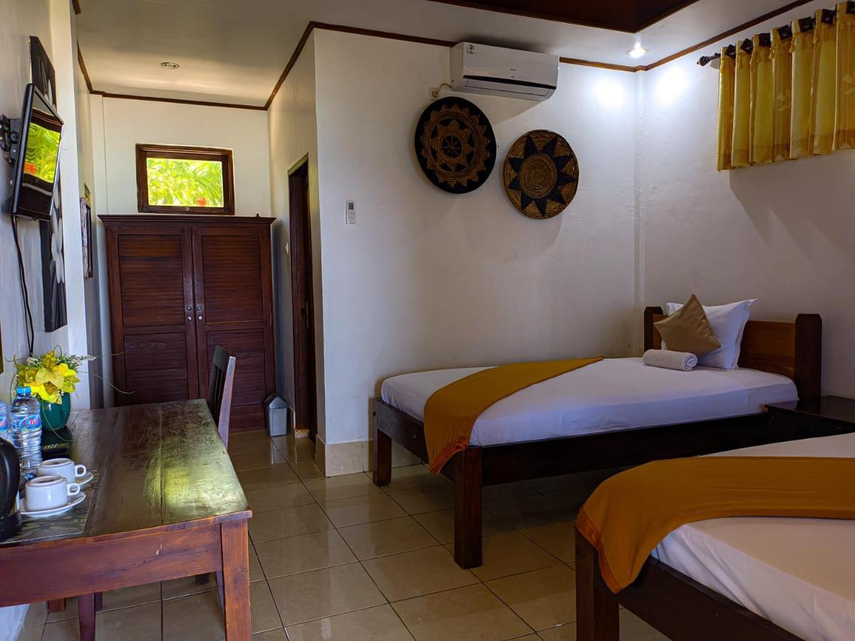 Anda Beach Hotel Bira Exterior foto