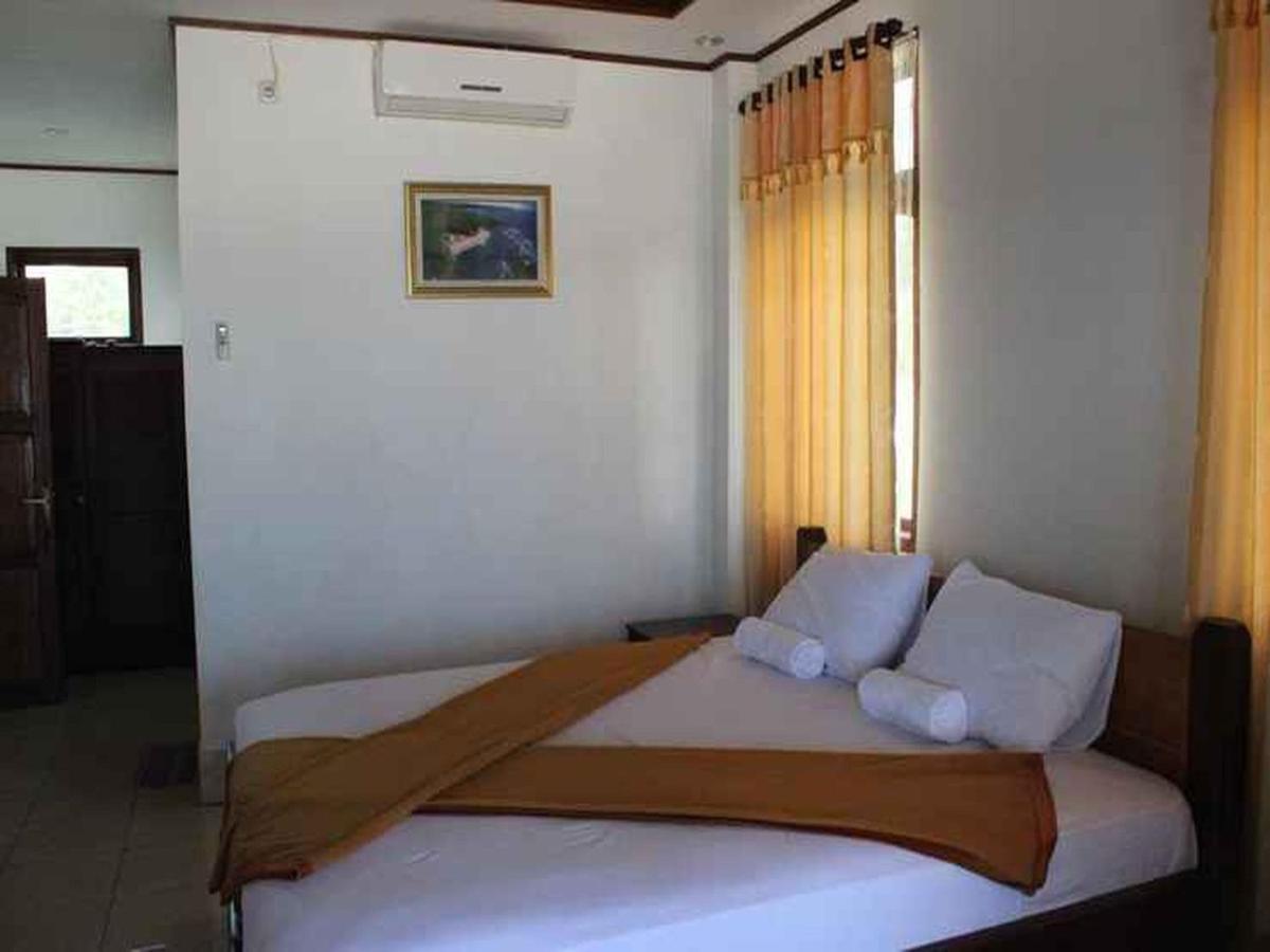 Anda Beach Hotel Bira Exterior foto